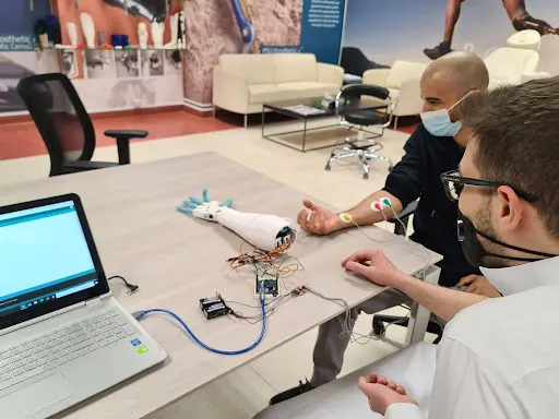 A student-built robotic arm controlled by muscle signals